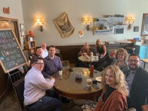 Group of AMA members meeting at a coffee shop