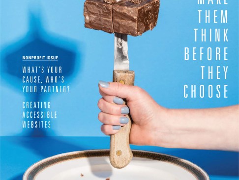 image of someone holding a knife with a brownie impaled on it