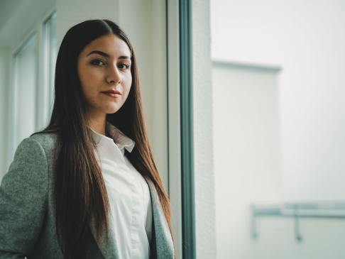 Professional woman gray suit